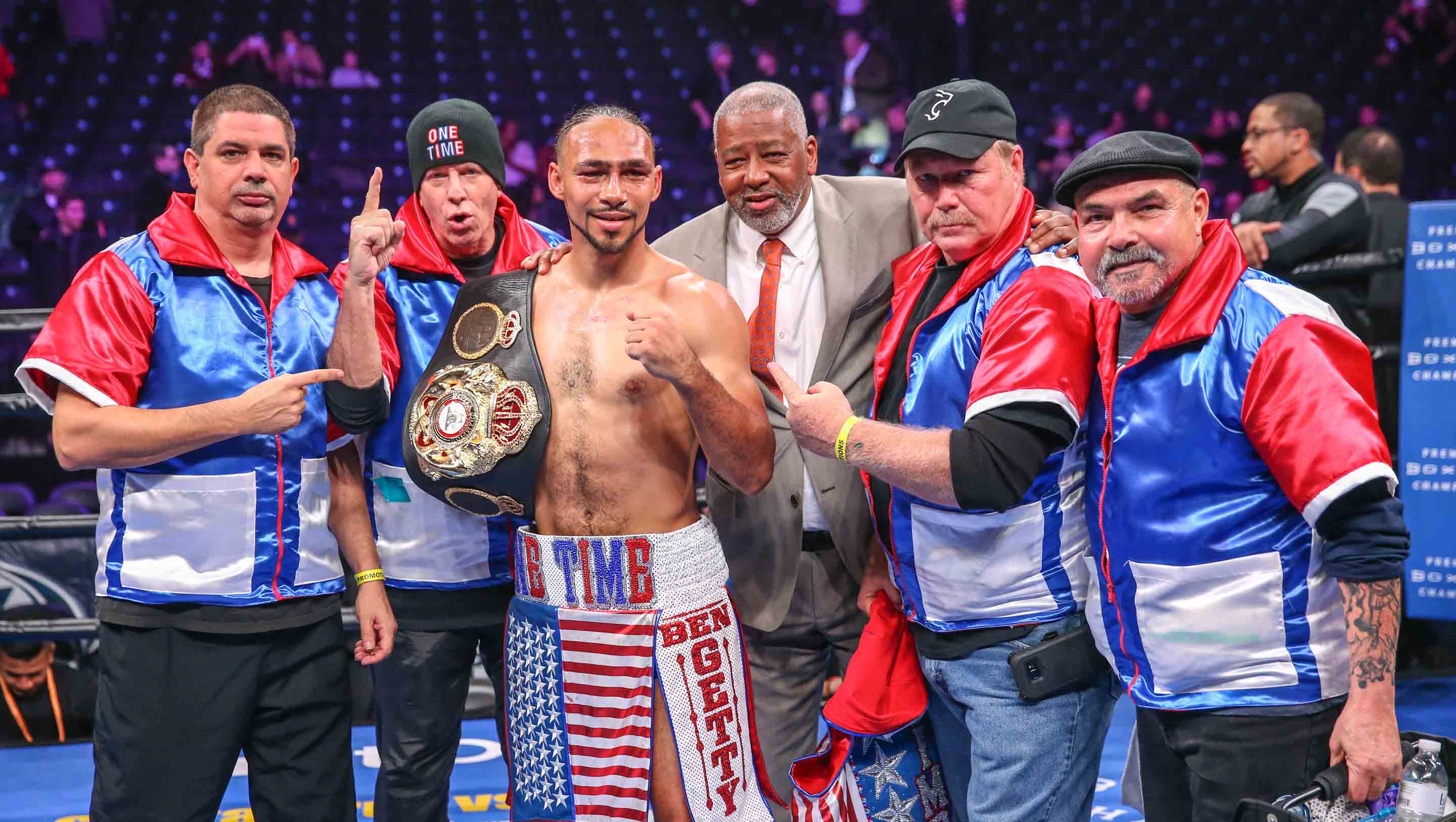 Thurman poses with team following victory